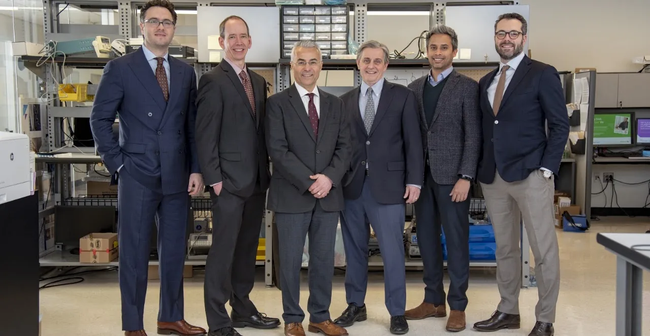 Six institute investigators standing together in the Bioelectronics Laboratory